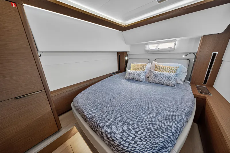 Slide: The Image of Luxurious bedroom interior of 2021 Lagoon 46 Owner's Version yacht with modern design. - 94