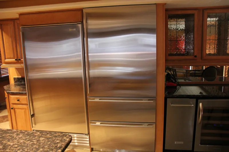 Slide: The Image of Modern kitchen with stainless steel appliances and wooden cabinetry, Sumerset Steel Away 2007 model. - 7