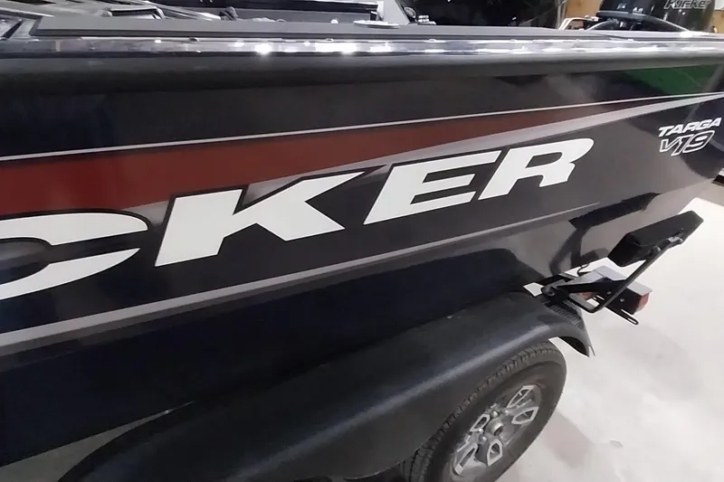 Slide: The Image of 2025 Tracker Targa V-19 WT boat side view with bold lettering. - 10