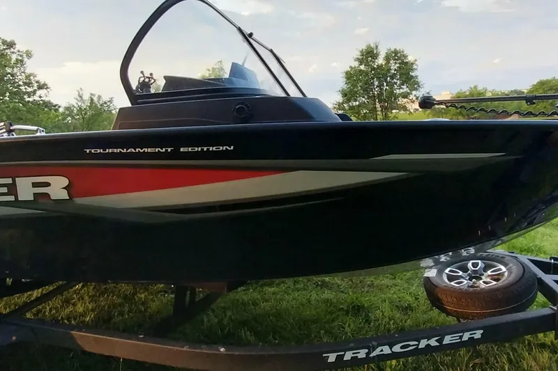 Slide: The Image of 2025 Tracker Targa V-19 WT Tournament Edition boat on trailer, side view. - 25