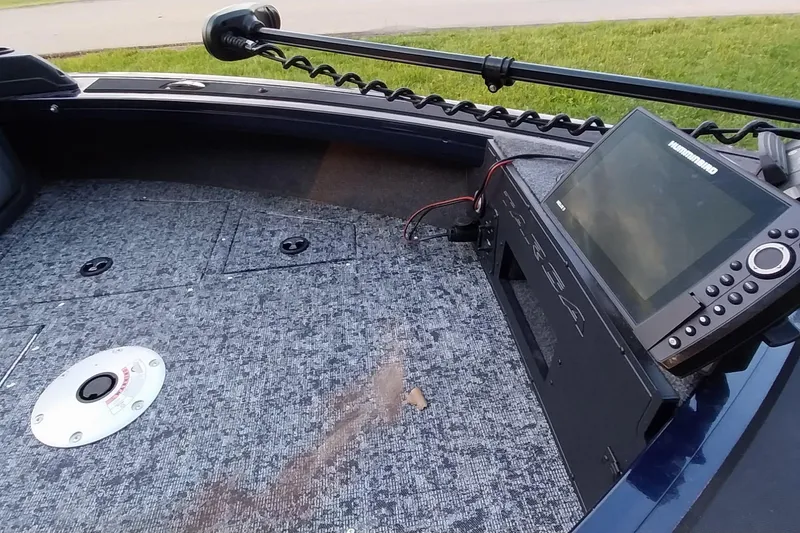 Slide: The Image of 2025 Tracker Targa V-19 WT boat deck with fish finder and trolling motor. - 27