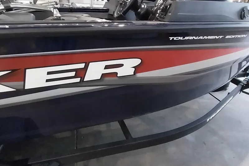 Slide: The Image of 2025 Tracker Targa V-19 WT boat, Tournament Edition, side view with bold graphics. - 38