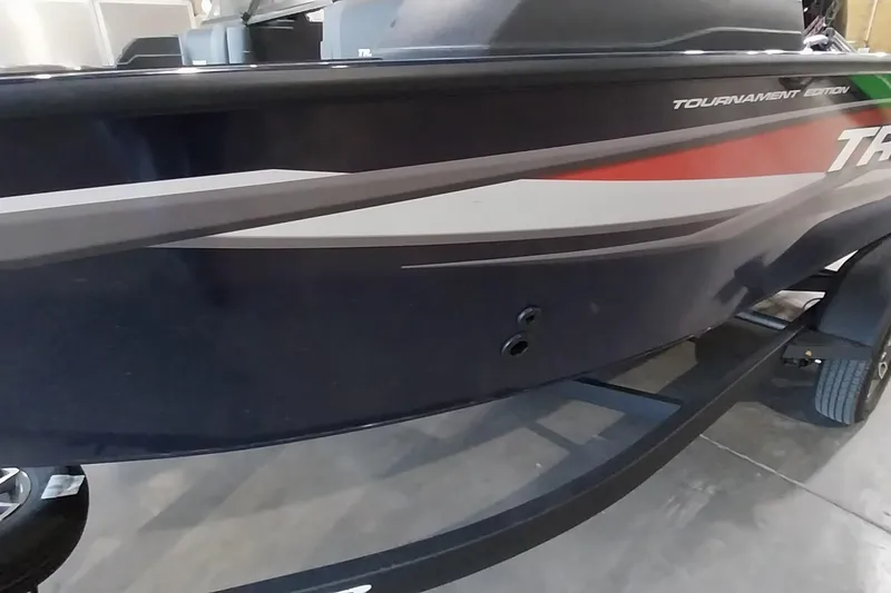 Slide: The Image of 2025 Tracker Targa V-19 WT boat, Tournament Edition, on trailer in garage. - 7