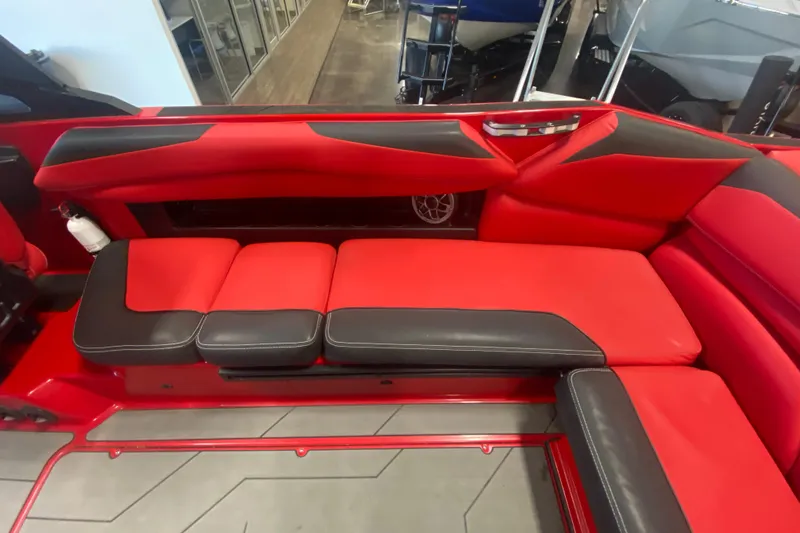 Slide: The Image of 2019 Axis A24 boat interior with red and black seating, modern design. - 18