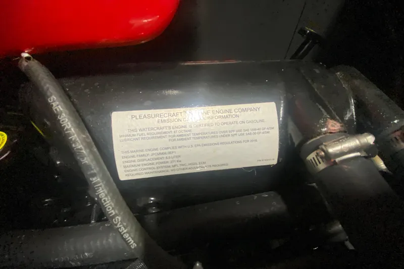 Slide: The Image of 2019 Axis A24 engine label showing emission and fuel requirements. - 20