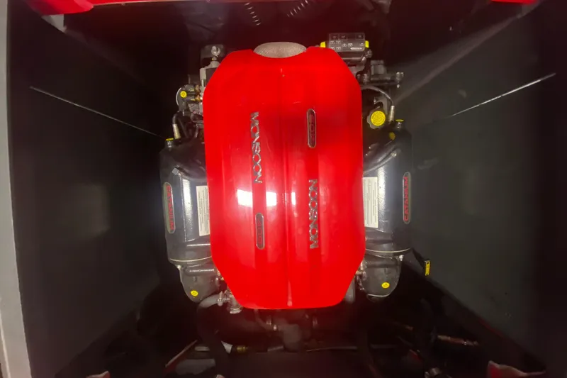 Slide: The Image of 2019 Axis A24 engine with red Monsoon cover, top view. - 21