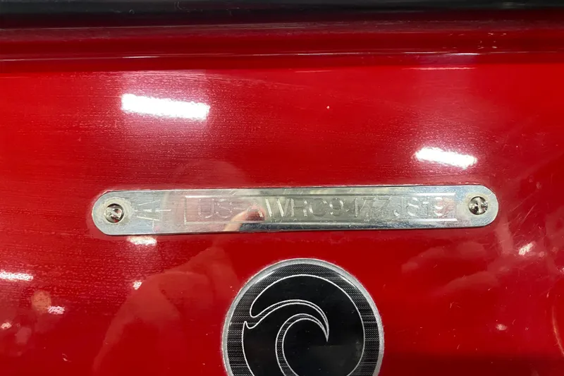 Slide: The Image of Red 2019 Axis A24 boat with metal identification plate and logo. - 28