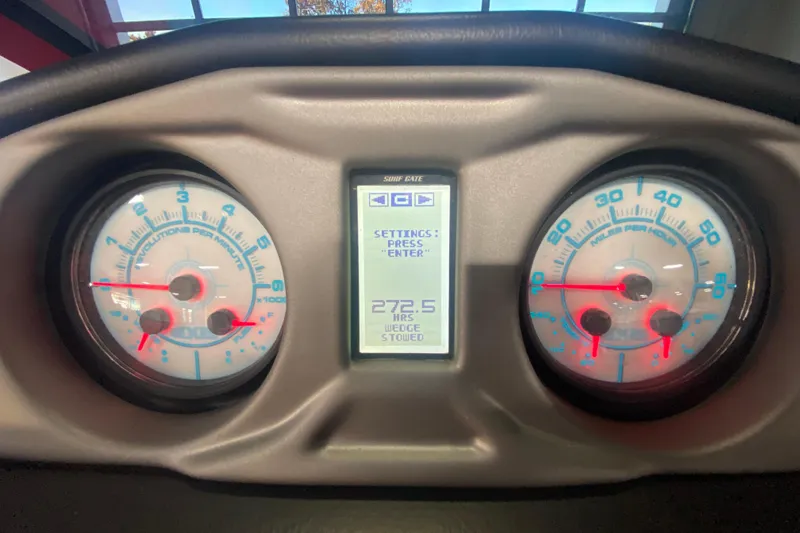 Slide: The Image of Dashboard of 2019 Axis A24 boat showing RPM and speed gauges. - 5