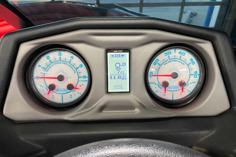 Slide: The Image of 2019 Axis A24 dashboard with speedometer and tachometer gauges. - 9