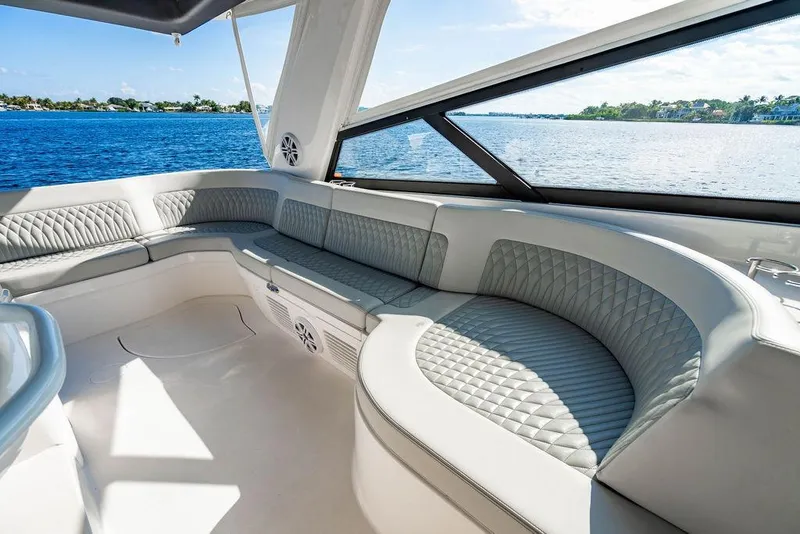Slide: The Image of Luxurious seating area on 2022 Intrepid 477 Evolution yacht with ocean view. - 12