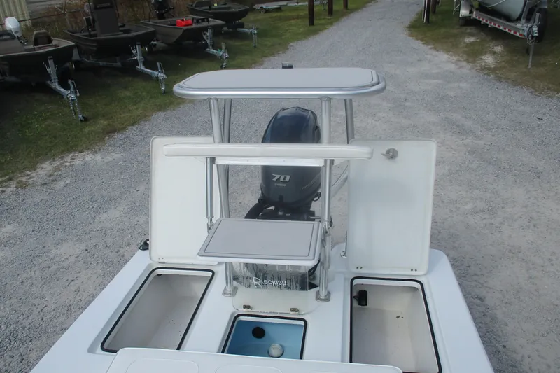 Slide: The Image of Brackish 19 boat, 2022 model, featuring storage compartments and a 70 HP outboard motor. - 11