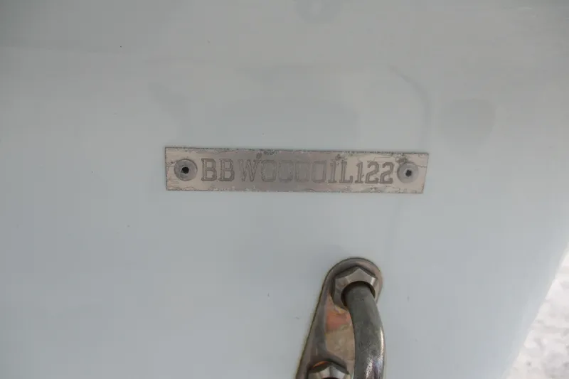 Slide: The Image of Metallic identification plate on Brackish 19, 2022 model, with engraved serial number. - 13