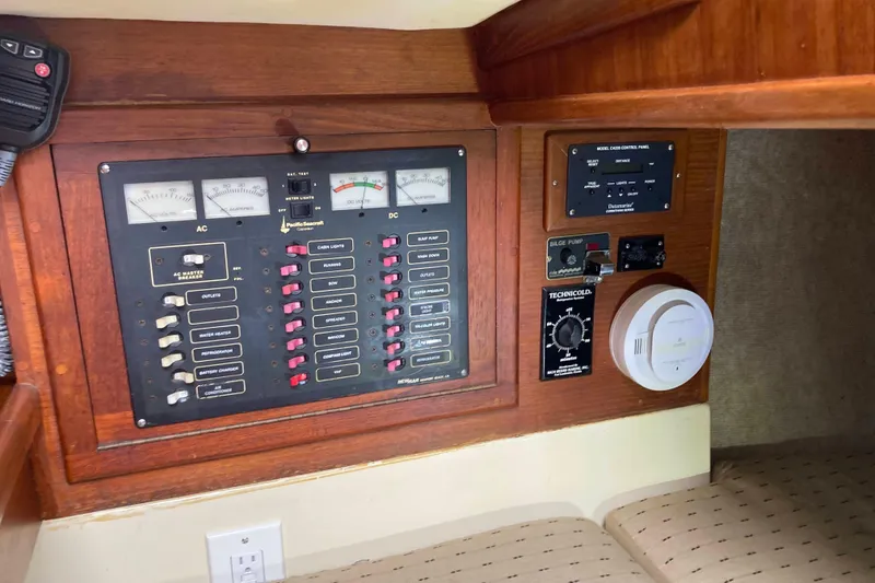 Slide: The Image of Electrical control panel on 1990 Pacific Seacraft 34 Voyager sailboat interior. - 22