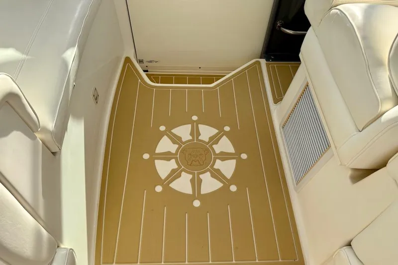 Slide: The Image of 2006 Cruisers Yachts 415 Express Motoryacht interior with nautical-themed flooring design. - 11