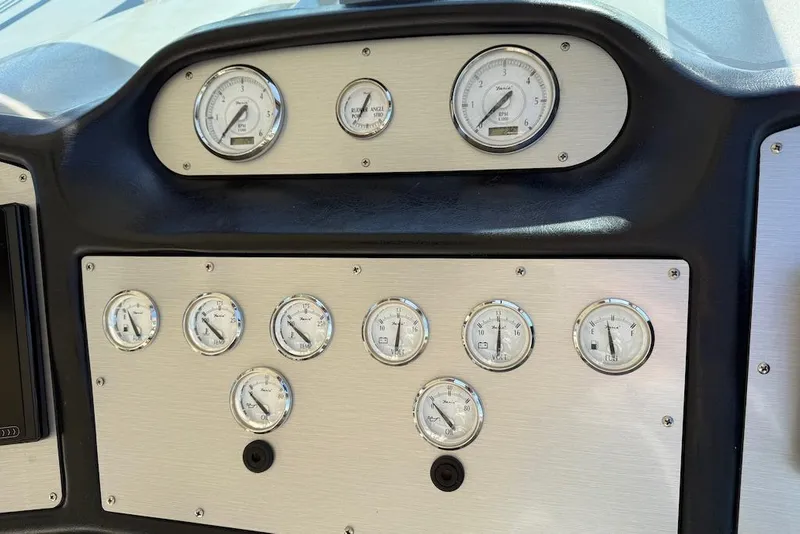 Slide: The Image of Dashboard gauges of a 2006 Cruisers Yachts 415 Express Motoryacht. - 15