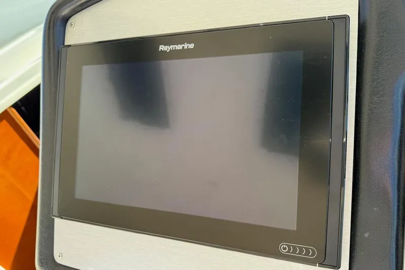 Slide: The Image of Raymarine display on 2006 Cruisers Yachts 415 Express Motoryacht dashboard. - 16
