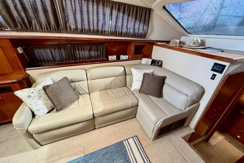 Slide: The Image of Luxurious interior of 2006 Cruisers Yachts 415 Express Motoryacht with plush seating and elegant decor. - 21