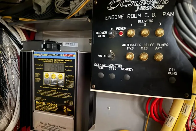 Slide: The Image of Control panel and charger in 2006 Cruisers Yachts 415 Express Motoryacht engine room. - 37