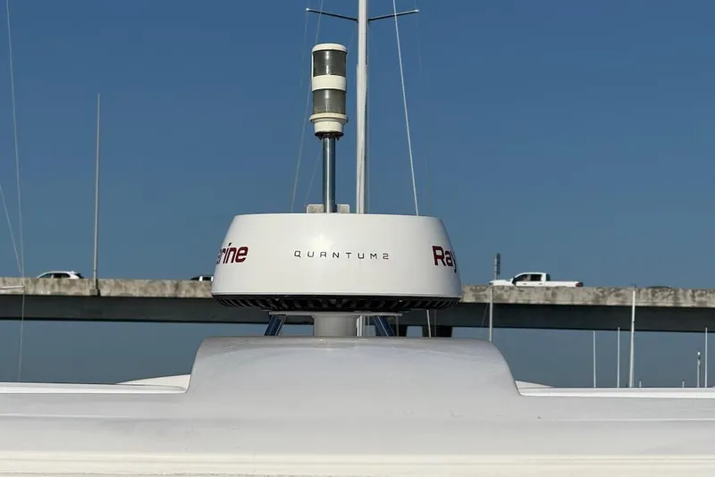 Slide: The Image of Radar system on 2006 Cruisers Yachts 415 Express Motoryacht against clear blue sky. - 8