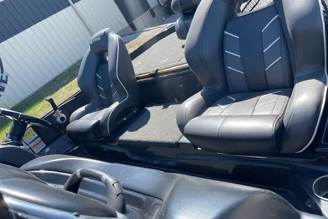 Slide: The Image of 2018 Nitro Z21 boat interior with black leather seats. - 6