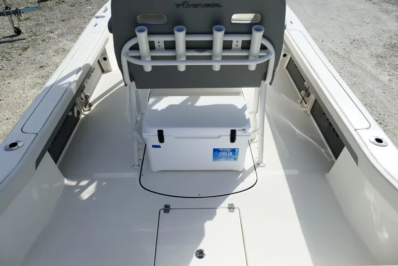 Slide: The Image of 2026 Avenger AV26 boat interior with cooler and rod holders on deck. - 20