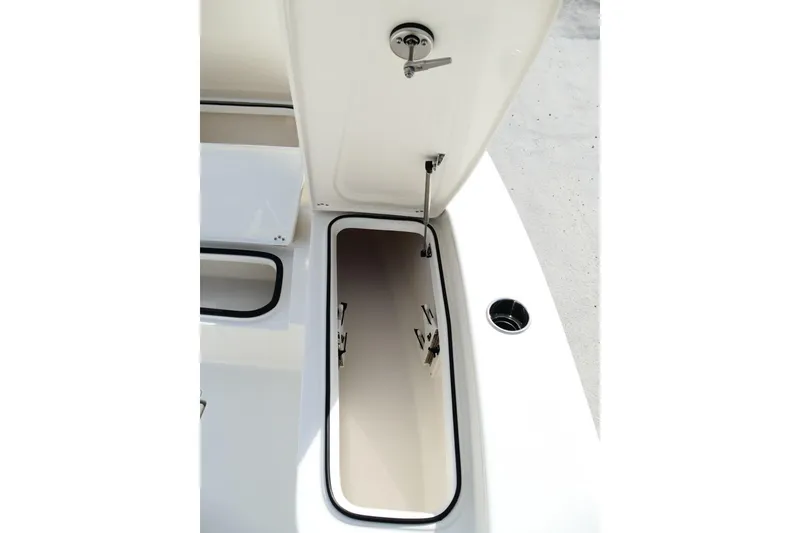 Slide: The Image of Open storage compartment on 2026 Avenger AV26 boat, showcasing interior space. - 40