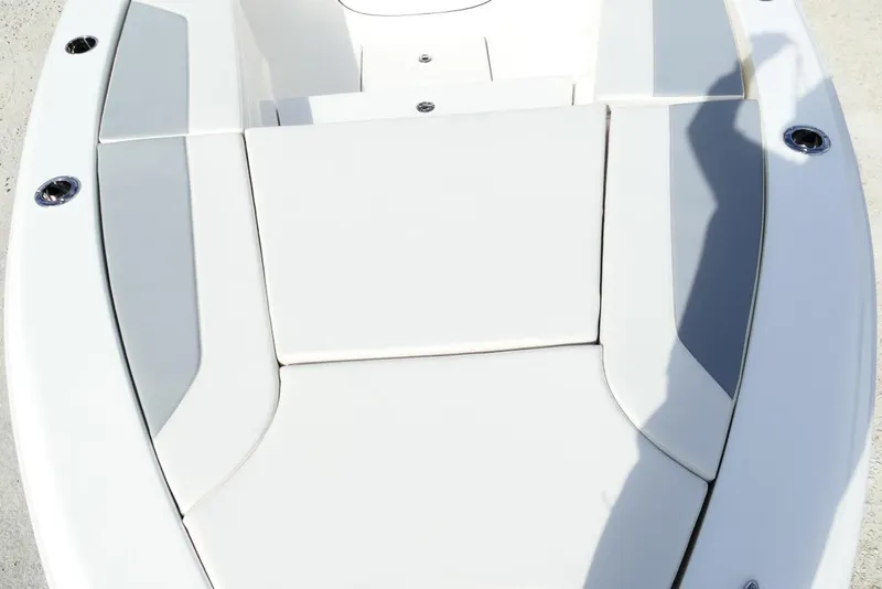 Slide: The Image of 2026 Avenger AV26 boat with white cushioned seating and sleek design. - 46