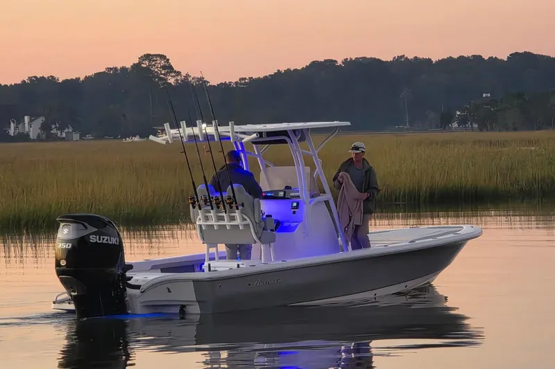 Slide: The Image of Avenger AV26 boat cruising at sunset with fishing gear, 2026 model. - 5