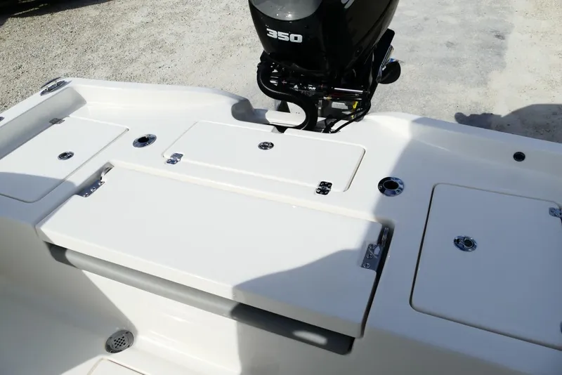 Slide: The Image of 2026 Avenger AV26 boat with 350 horsepower engine, featuring storage compartments. - 56