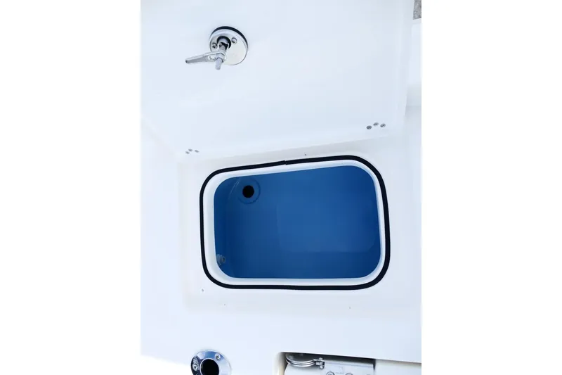 Slide: The Image of Avenger AV26 2026 model boat compartment with blue interior and chrome handle. - 61