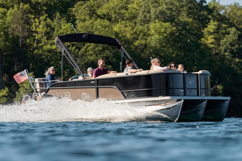 The Image of Manufacturer Provided Image: 2023 Crest Classic DLX 240 pontoon boat cruising on a lake with passengers. - 0