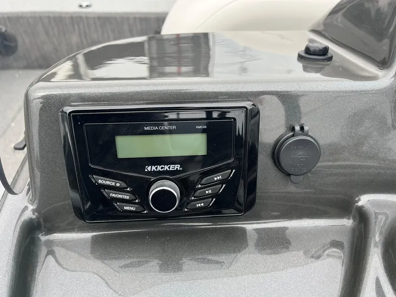 Slide: The Image of Kicker media center on 2025 Lowe Deck SD224 boat dashboard. - 22