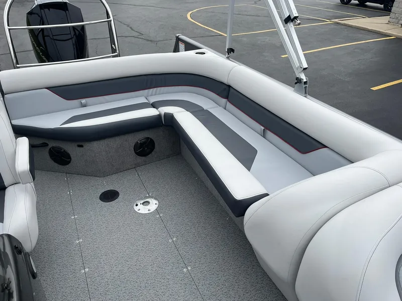 Slide: The Image of 2025 Lowe Deck SD224 boat interior with gray seating and modern design. - 25