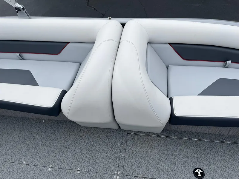 Slide: The Image of 2025 Lowe Deck SD224 boat interior with gray and white seating. - 26