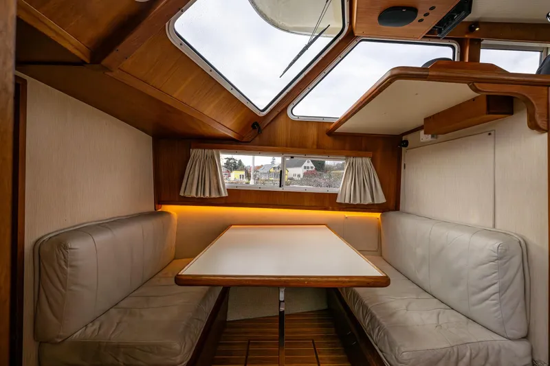 Slide: The Image of Modern kitchen sink and stovetop on 1991 Tollycraft 48 Cockpit Motor Yacht. - 36