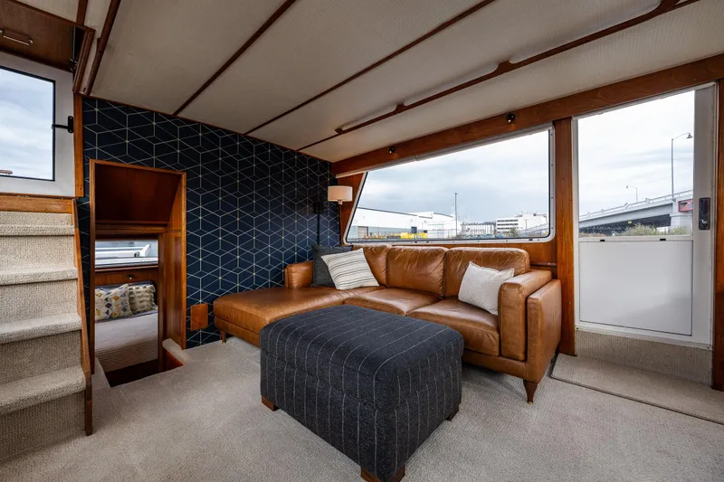 Slide: The Image of Interior of 1991 Tollycraft 48 Cockpit Motor Yacht with cozy dining area. - 38