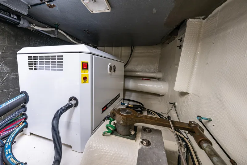 Slide: The Image of Engine room of 1991 Tollycraft 48 Cockpit Motor Yacht with electrical systems and wiring. - 56