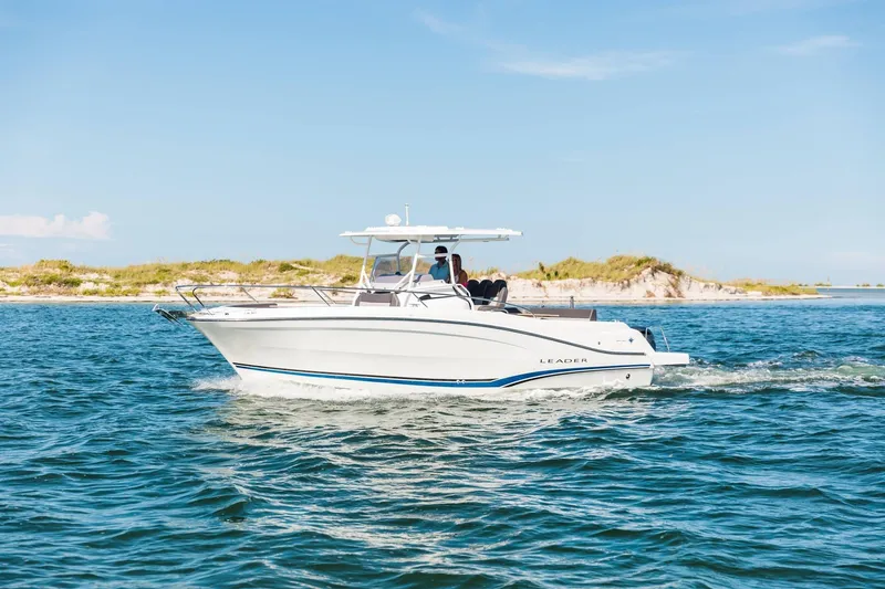 The Image of 2025 Jeanneau Leader 9.0 CC cruising on open water under clear skies. - 1