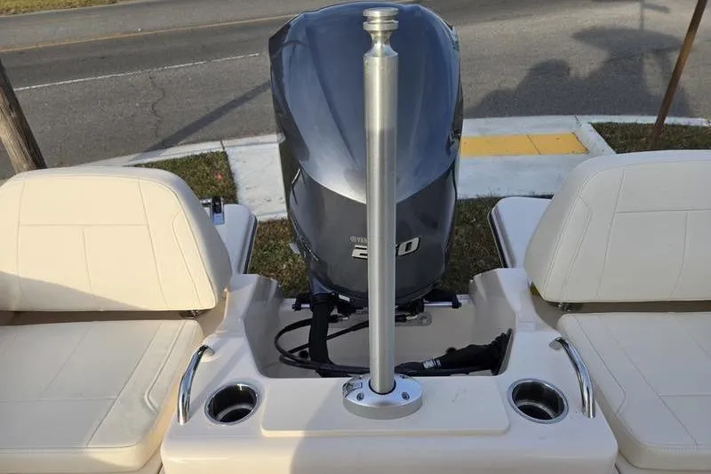 Slide: The Image of 2026 Grady-White Fisherman 216 boat with Yamaha engine and seating area. - 15