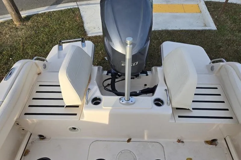 Slide: The Image of 2026 Grady-White Fisherman 216 boat with dual seats and powerful outboard motor. - 19