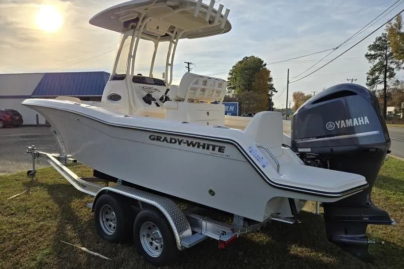 Slide: The Image of 2026 Grady-White Fisherman 216 boat on trailer with Yamaha engine, parked outdoors. - 5