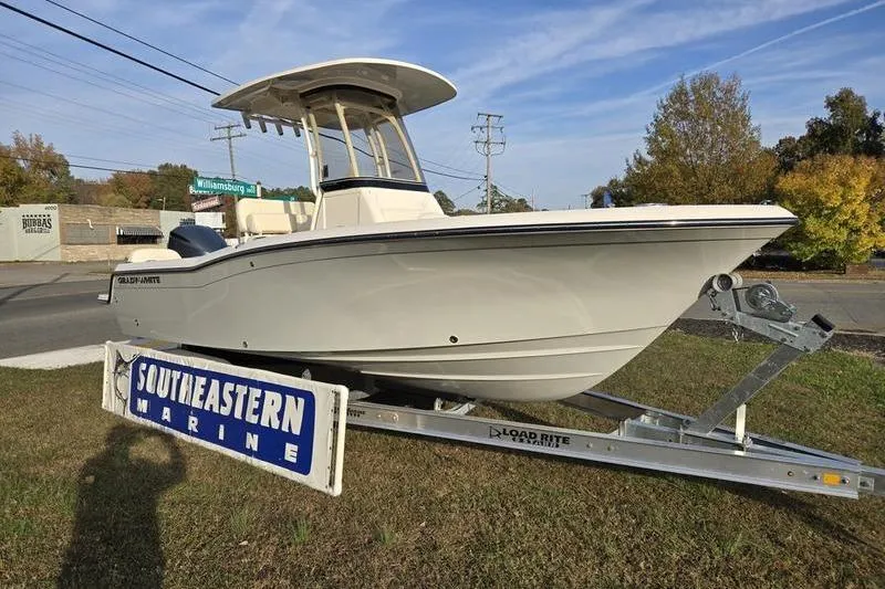 Slide: The Image of 2026 Grady-White Fisherman 216 boat on trailer at Southeastern Marine dealership. - 7