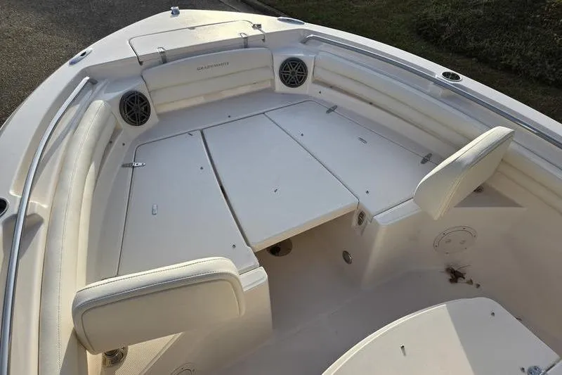 Slide: The Image of 2026 Grady-White Fisherman 216 boat interior with seating and storage compartments. - 8