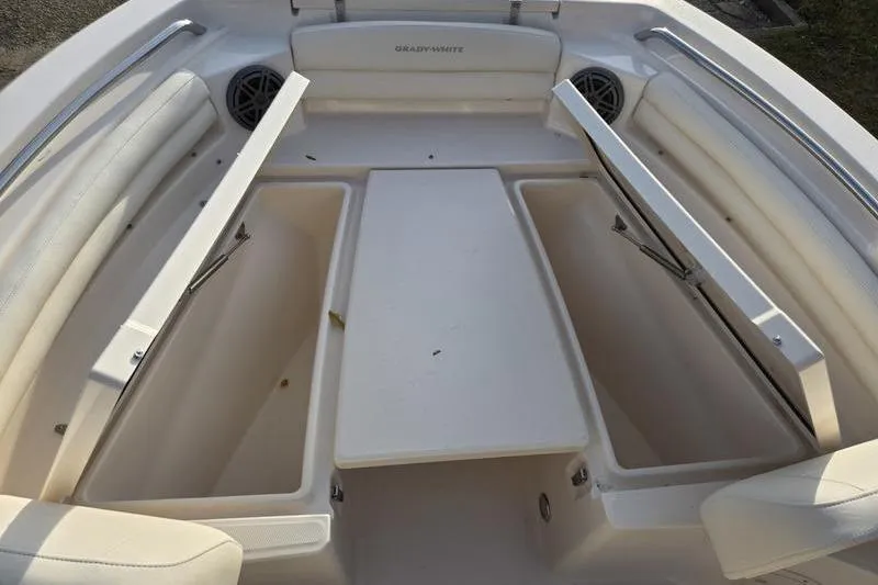 Slide: The Image of 2026 Grady-White Fisherman 216 boat interior with open storage compartments. - 9