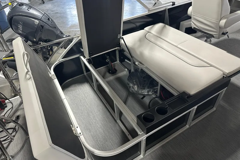 Slide: The Image of 2026 Godfrey SW 2286 SFL boat interior with seating and storage compartments. - 10