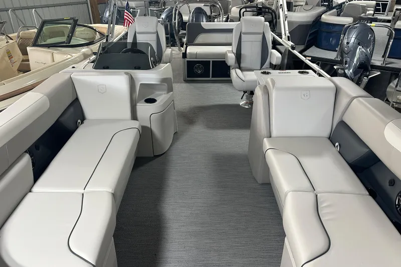 Slide: The Image of 2026 Godfrey SW 2286 SFL pontoon boat interior with luxurious seating and modern design. - 18