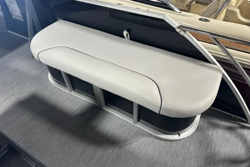 Slide: The Image of 2026 Godfrey SW 2286 SFL boat interior with cushioned seating and sleek design. - 6