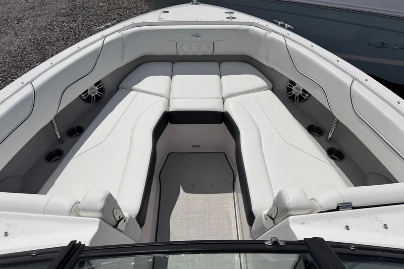 Slide: The Image of Luxurious 2025 Regal LS6 boat interior with white seating and modern design. - 15