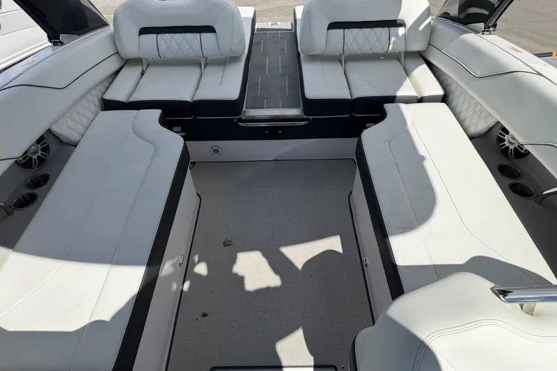 Slide: The Image of Luxurious interior of 2025 Regal LS6 boat with spacious seating and elegant design. - 16