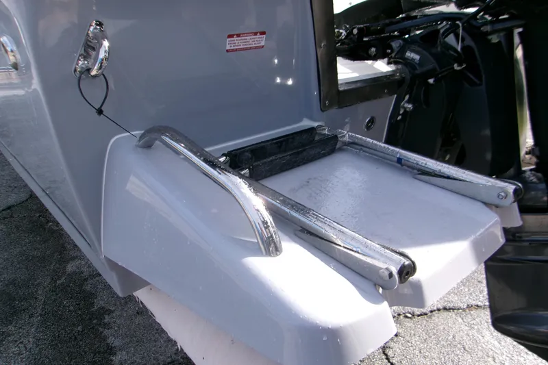 Slide: The Image of 2026 Key West 1720 Center Console boat with foldable swim ladder. - 13